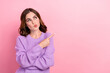© deagreez - Portrait of thoughtful pretty girl with curly hairdo wear violet pullover indicating look empty space isolated on pink color background