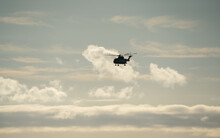Silhouette Of British Joint Helicopter Command (JHC) Royal Air Force Puma HC2 On A Military Exercise, Wiltshire UKK