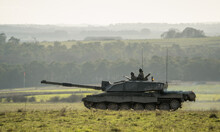 Commander And Gunner Directing Action In A British Army FV4034 Challenger 2 Ii Main Battle Tank On A Military Combat Exercise, Wiltshire UK