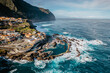 © Eva - Aerial view of Porto Moniz with volcanic lava swimming pools,Madeira.Saltwater natural pools created in lava formations by Atlantic ocean.Gorgeous views,relaxation,crystal-clear water.