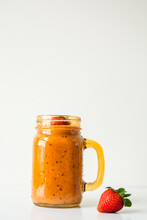 Close-up Of Smoothie In Mason Jar Against White Background