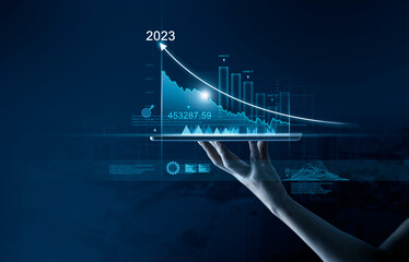 Leinwandbilder - Business man holding tablet with showing growth planning, opportunity, challenge and business strategy graphs and target of business gain profits in 2023, New goal, Plan and visions for next year.