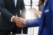 © itchaznong - Business shaking hands. Successful businessmen handshaking after good deal. Finishing up meeting concept