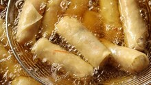 Top View Of Deep Frying Spring Roll In Boiling Oil, Chinese Food