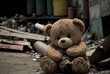 Homeless teddy bear in dirty city slums alone and emotionally sad; forgotten, unloved and lost surrounded by abandoned destroyed building ruins - Generative AI illustration.