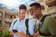 © S Fanti/peopleimages.com - Students, university and friends with phone at campus for knowledge research. Cellphone technology, education and happy people or men holding mobile smartphone for social media or streaming video.