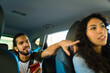 © AntonioDiaz - Passenger giving directions to the woman driver