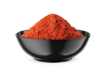 Wall Mural - Ground red pepper in black bowl isolated on white. Front view.