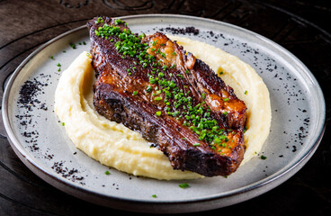 Wall Mural - Beef brisket slice and mashed potato on white plate