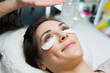 © auremar - closeup of woman having facial beauty treatments