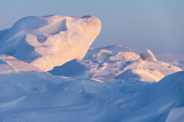 Wall Mural - winter arctic landscape. view of ice hummocks and snowdrifts. the surface of the frozen sea. snow-co