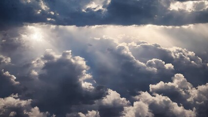 Wall Mural - an aerial shot above beautiful cloudscape with sun rays coming through the clouds, detailed pictures