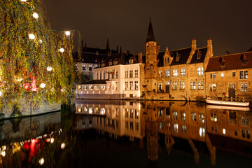 Wall Mural - Medieval buildings in Bruges, Belgium old town Brugge illuminated at night