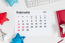 President's Day. Date On Calendar February 20, 2023. Red, Blue And White Star Balloon, Decorations On White Background. Happy Presidents Day, Calendar. Flat Lay, Top View, Copy Space