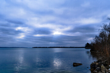 Naklejka na meble cloudy day with overcast a beautiful reflection on the calm waters 