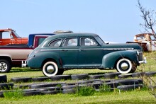 An Old Car With Whitewall Tires