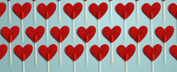Wall Mural - Valentines day or Appreciation theme with red glitter heart picks