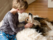 © Cavan Images - boy and his beloved dog