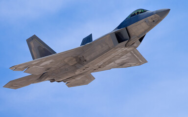 Very close view of a F-22 Raptor approaching in beautiful light