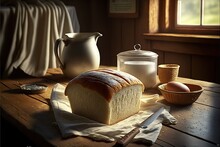  A Loaf Of Bread Sitting On Top Of A Wooden Table Next To A Bowl Of Eggs And A Pitcher Of Milk On A Table Cloth With A Cloth And A Knife And A Bowl With A.