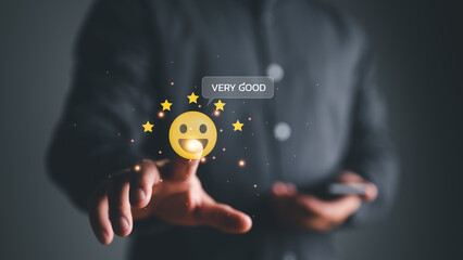 Wall Mural - close up businessman hand touching on five star icon and happy smile face for feedback review satisfaction service, Customer service experience and business satisfaction survey.