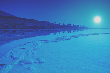 Fototapete - Seascape in dark trendy blue. The Dead Sea at night