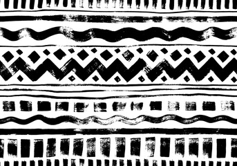 Hand drawn tribal and ethnic seamless pattern. Vector tribal design monochrome background with horizontal stripes, zig zag and wavy lines, dahses and squares. Aztec abstract geometric ornament.