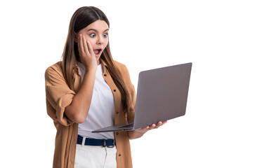 surprised teen girl blogging with laptop isolated on white background. communication of girl