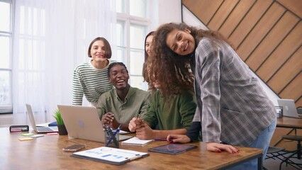 Wall Mural - portrait of a multicultural business team in the workplace. Slow motion 60fps 4k.