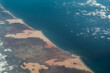 Aerial landscape view of Somalian coastline around the City of Baraawe , the Capital of the South West State of Somalia in the Lower Shebelle region located at Indian Ocean with Baraawe Airport
