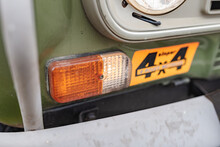 Close-up View Of The Turn Signal Of A Classic Car And A 4x4 Decal