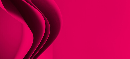 Abstract colored paper geometry composition monochrome background in viva magenta color with curved lines and shapes