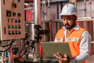 Team of engineers practicing maintenance Taking care and practicing maintenance of machines in the factory so that they can be used continuously.