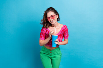 Wall Mural - Photo of positive cute lovely lady wear pink trendy clothes enjoy vacation weekend relax rest isolated on blue color background