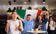© JackF - Company of screaming young adult sports fans waving flag of Italy and supporting national team with beer in bar