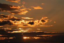 Orange Sunset Clouds With Beautiful Sun Sky Scape 