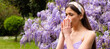 © Volodymyr - Spring allergy, flu. Banner. Girl with nose allergy sneezing. Polen illnes symptom concept. Woman allergic to blossom during spring blooming tree outdoor.