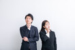 © 健二 中村 - スーツを着て考える男女　Business