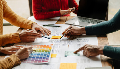 Wall Mural - ux developer and ui designer brainstorming about mobile app interface wireframe design with customer