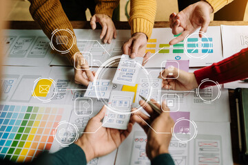 Wall Mural - ux developer and ui designer brainstorming about mobile app interface wireframe design with customer