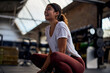 © Flamingo Images - Woman laughing after a gym workout