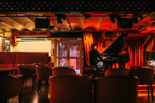 Man Playing Piano In A Club