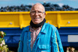 © Ezequiel Giménez/Stocksy - Happy aged farmer smiling in vineyard on sunny day