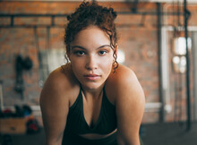 Fitness, Exercise And Portrait Of A Woman At Gym For A Workout And Training For Healthy Lifestyle And Body Wellness. Face Of Sports Female Or Athlete At Health Club For Balance, Energy And Power