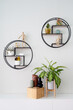 © Bisual Studio/Stocksy - Various decorations against gray wall