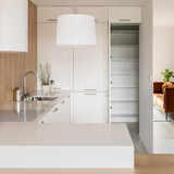 Fototapeta Przestrzenne - Modern white kitchen with open doors to pantry