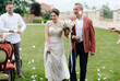 © Oleksii Syrotkin/Stocksy - Bride dad wedding ceremony guests
