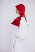 Profile Portrait Of Woman In Red Hood 