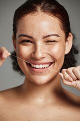 Wall Mural - teeth flossing, dental floss and portrait of woman with a smile in studio for oral hygiene, health a