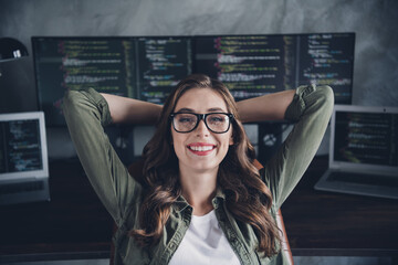 Wall Mural - photo of cheerful happy lady admin wear spectacles relaxing finishing works arms hands behind head i